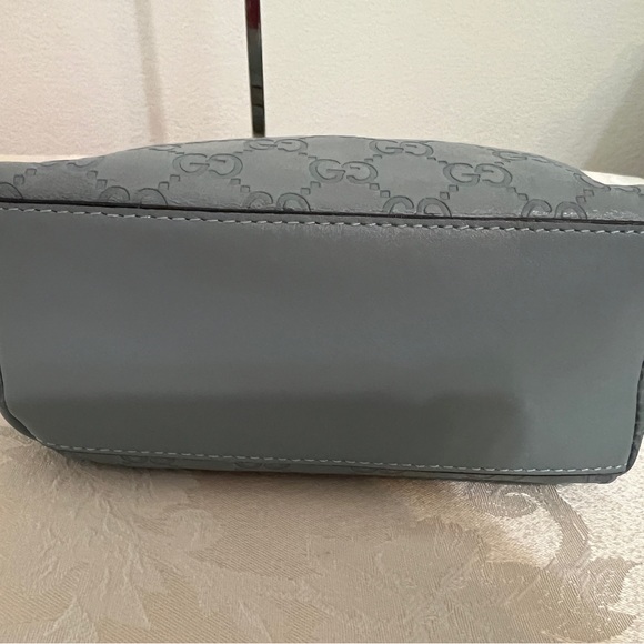 Gucci - authentic cosmetic pouch. Pairs beautifully with my Blue Coach handbag. - Picture 9 of 12